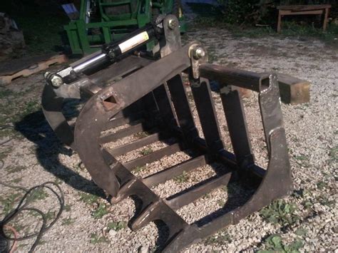 homemade skid steer grapple|best skid steer brush grapple.